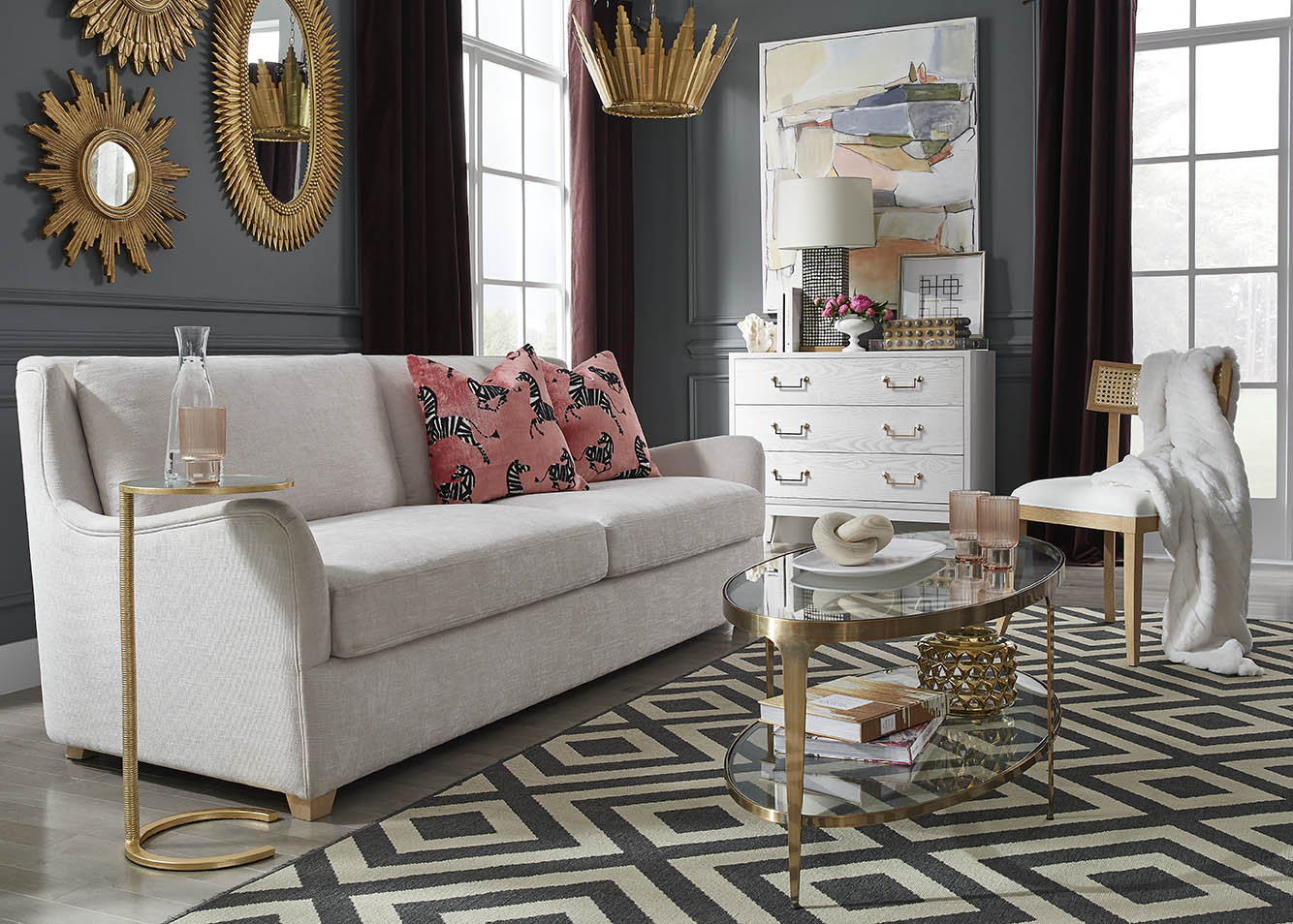 Worlds Away BRANDO ABR Brando Oval Coffee Table in Antique Brass, styled lifestyle view