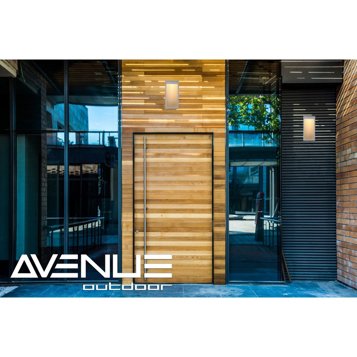 Avenue Outdoor Rectangular LED Wall Sconce AV9901-SLV installed on exterior — silver sconce with clean diffused glow on wall surface
