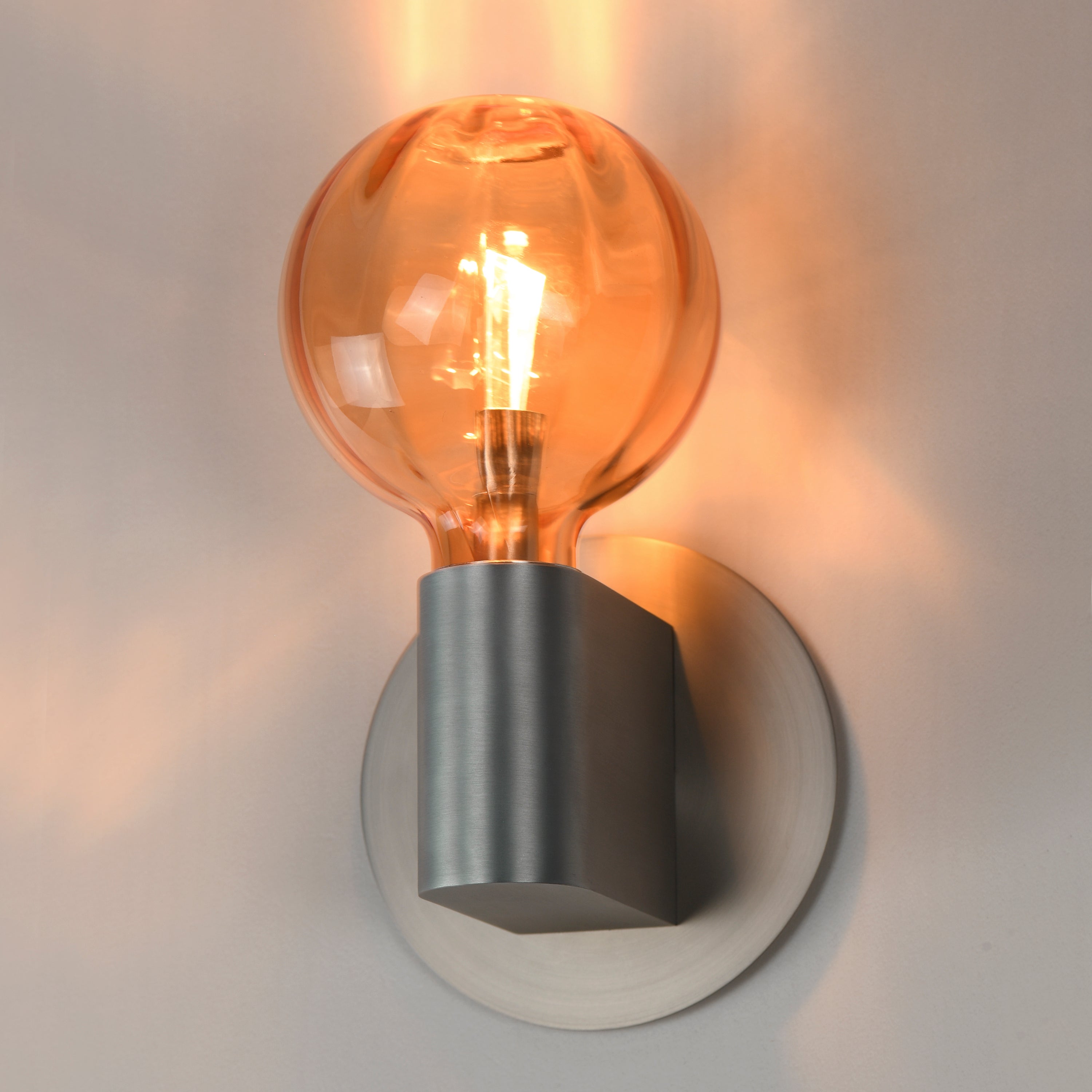 Studio M Lighting SM49324EMAL Ray Dance Globe Wall Sconce in Brushed Aluminum with Ember glass, installed lifestyle view