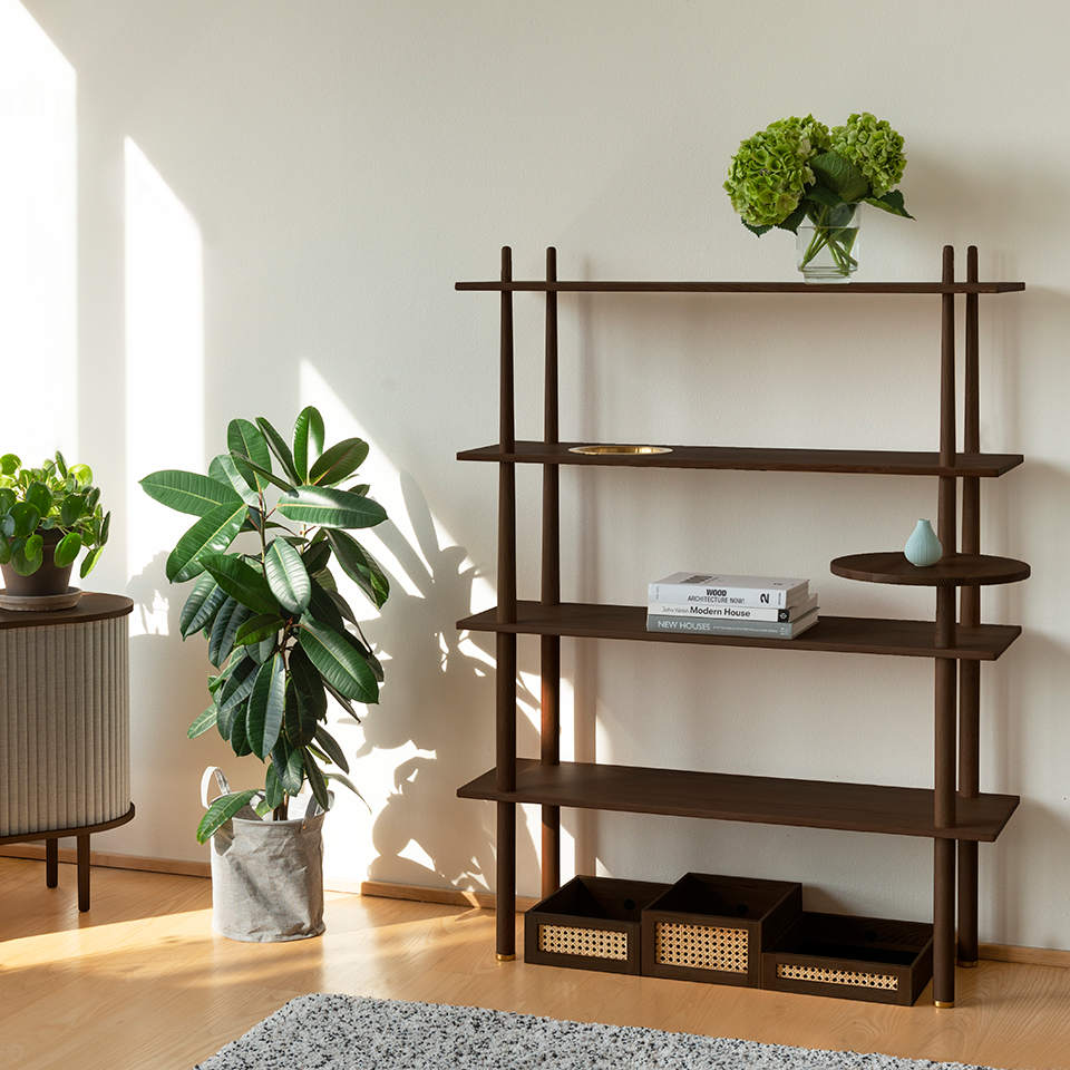 Umage Stories Shelving in dark oak, styled in a room