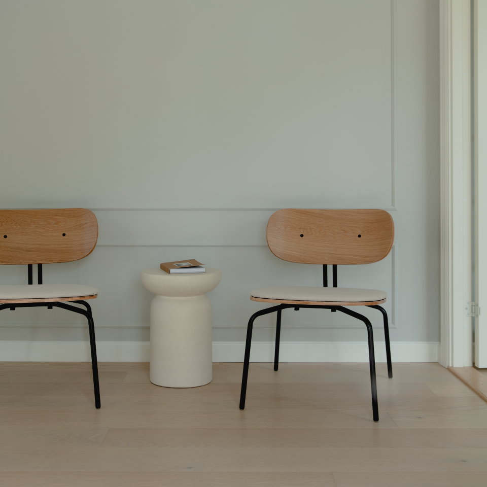 Umage Curious Lounge Chair styled in a living room