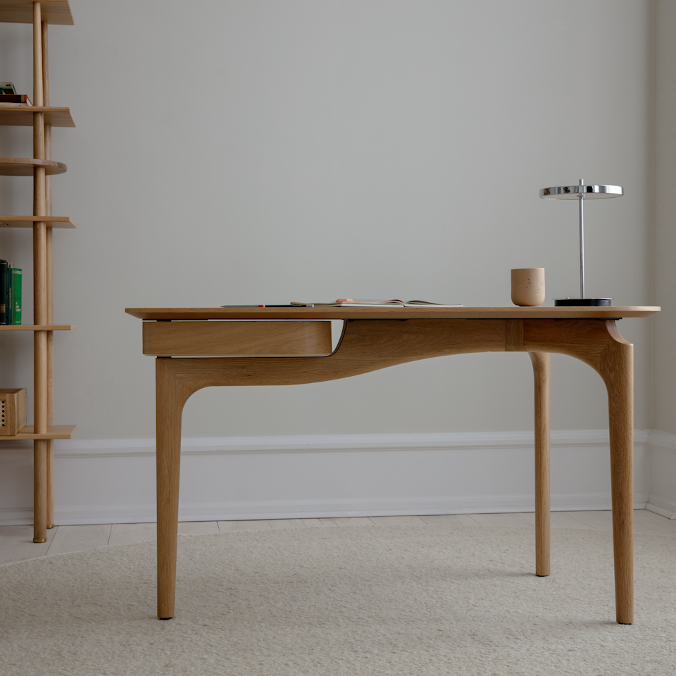 Umage Duende desk styled in a room setting
