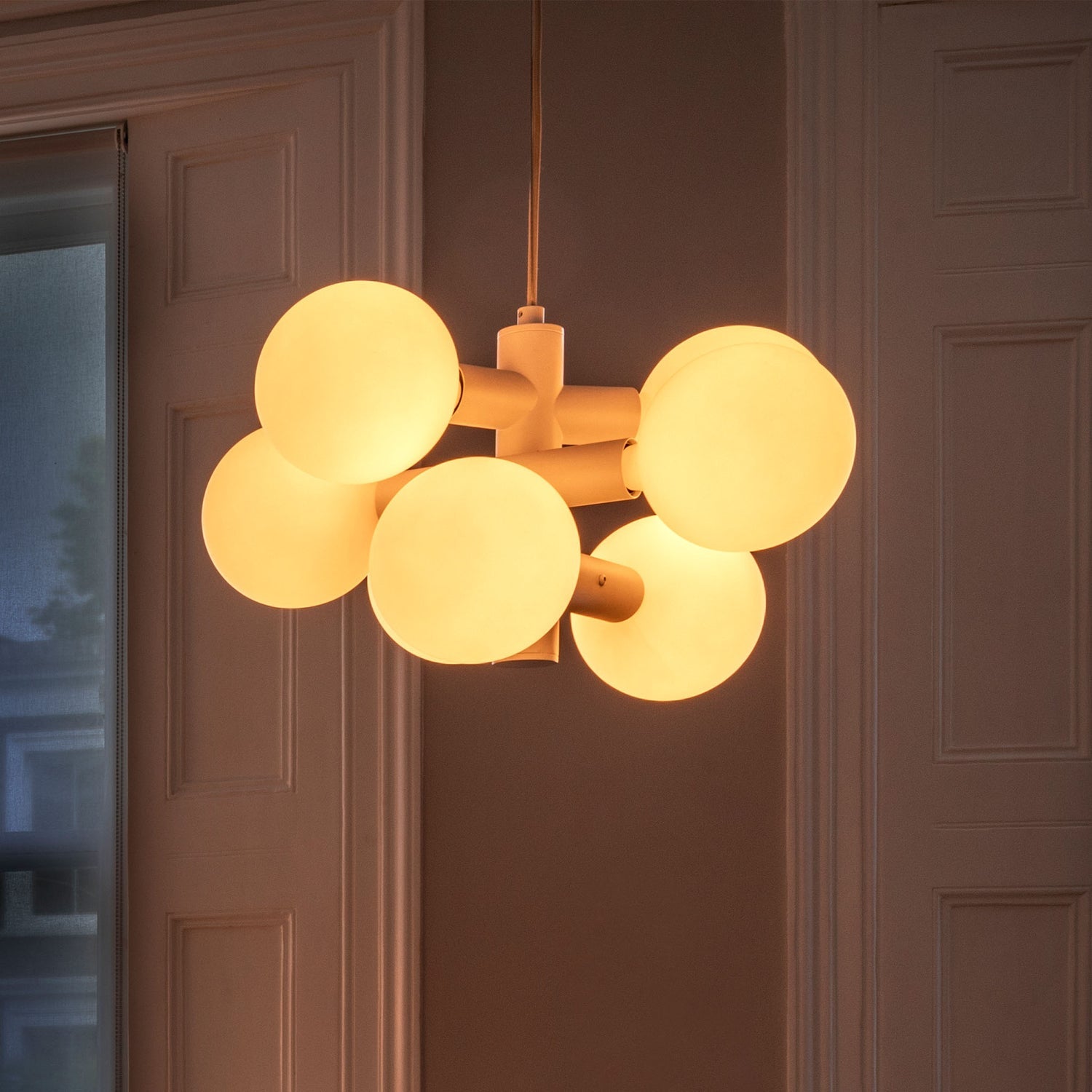 Tala Echo Chandelier lit close-up