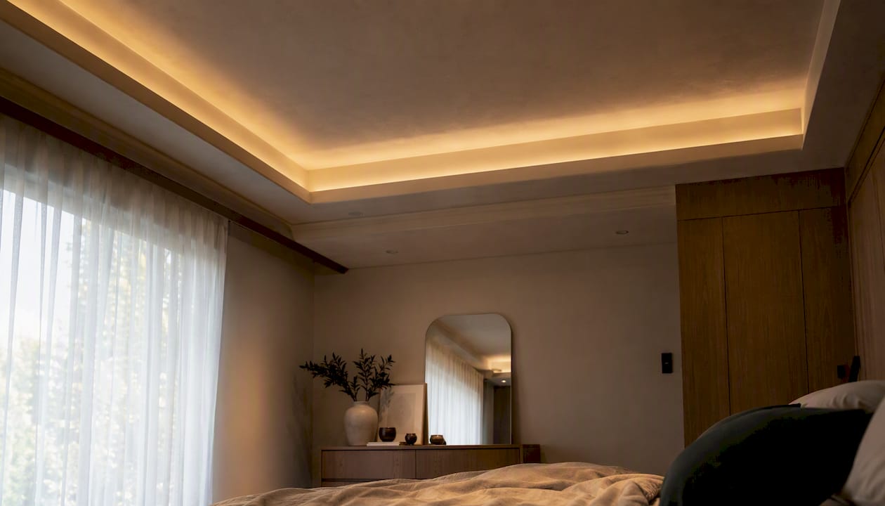 Living room with tray ceiling cove lighting