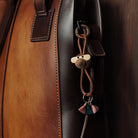 Porte-clés singe Kay Bojesen 39807 en teck/limba doré