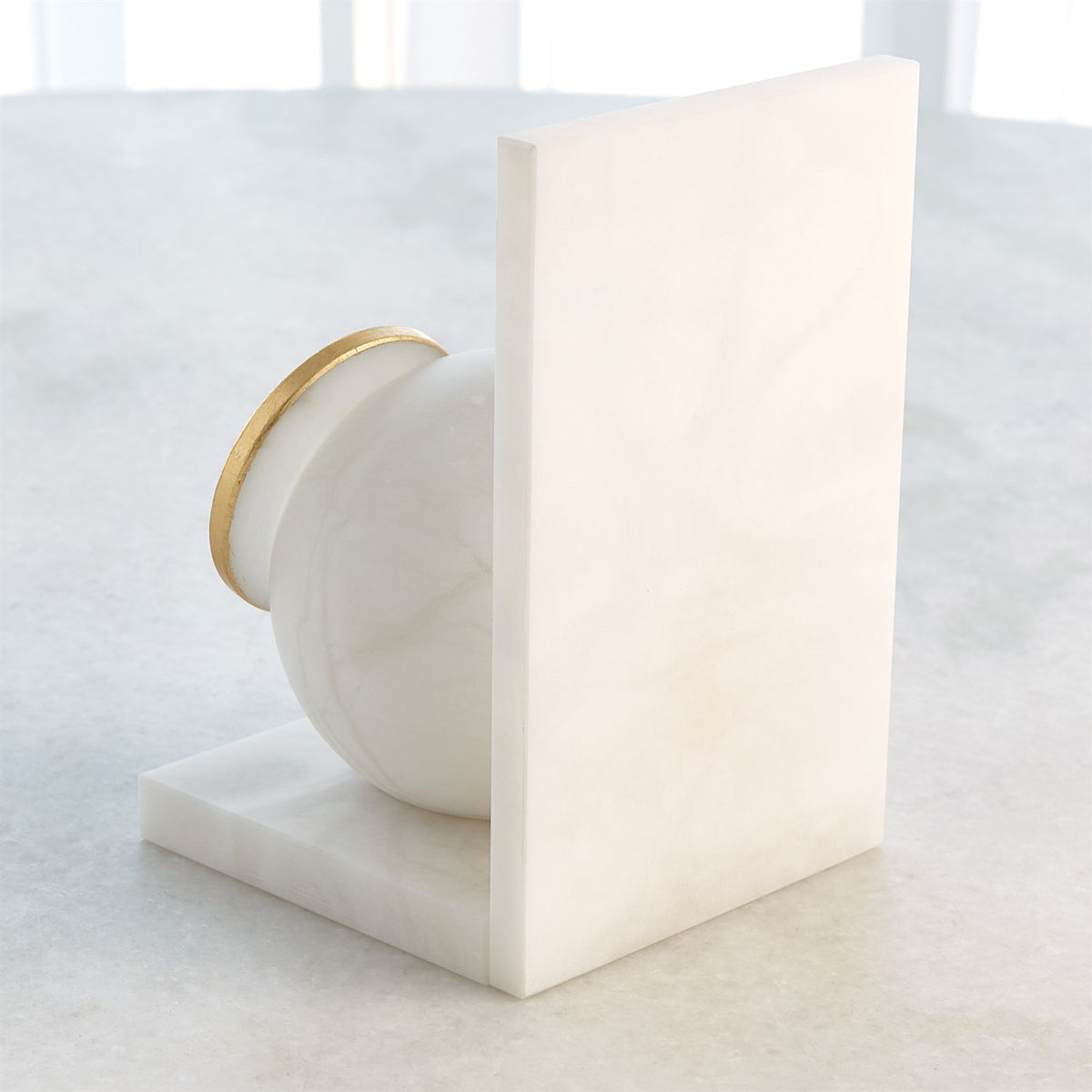 Paire de serre-livres en albâtre en forme de hibou aux grands yeux