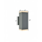 Avenue Outdoor Up/Down LED Wall Sconce AV9894-SLV installed on exterior — silver sconce projecting defined upward and downward beams on wall surface