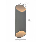 Avenue Outdoor Cylindrical LED Wall Sconce AV9895-SLV installed on exterior — silver cylinder casting even ambient glow on surrounding wall