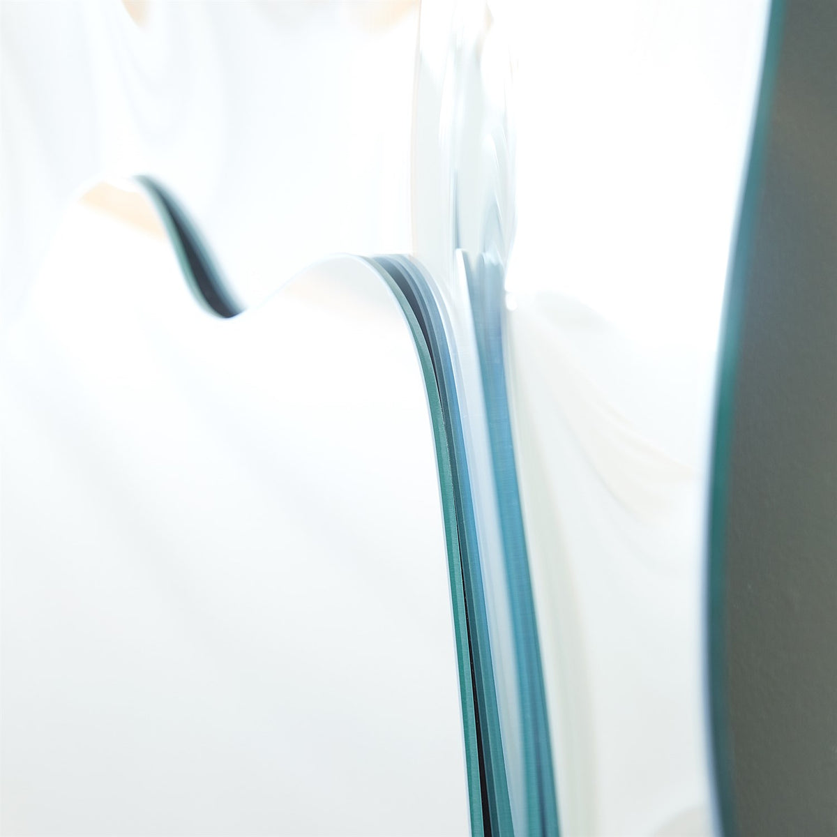 Asymmetrical Ripple Mirrors