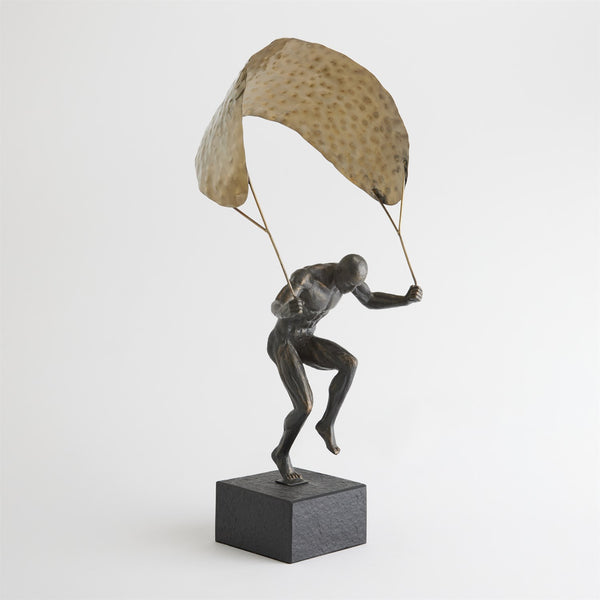Homme en parapente
