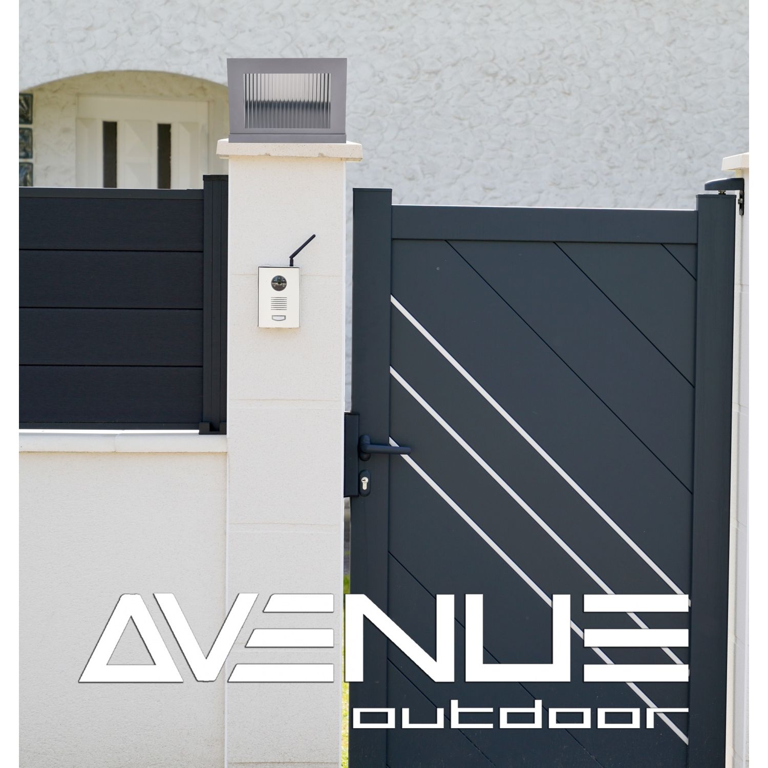Avenue Outdoor LED Pillar Mount AV9904-SLV installed atop masonry pillar — silver cap with LED glowing downward, warm ambient light on pillar