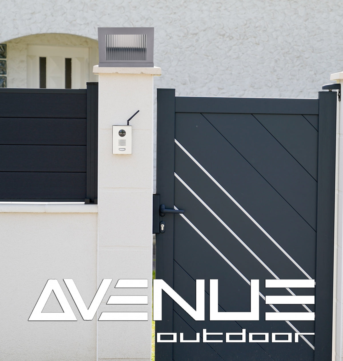 Avenue Outdoor LED Pillar Mount AV9904-SLV installed atop masonry pillar — silver cap with LED glowing downward, warm ambient light on pillar