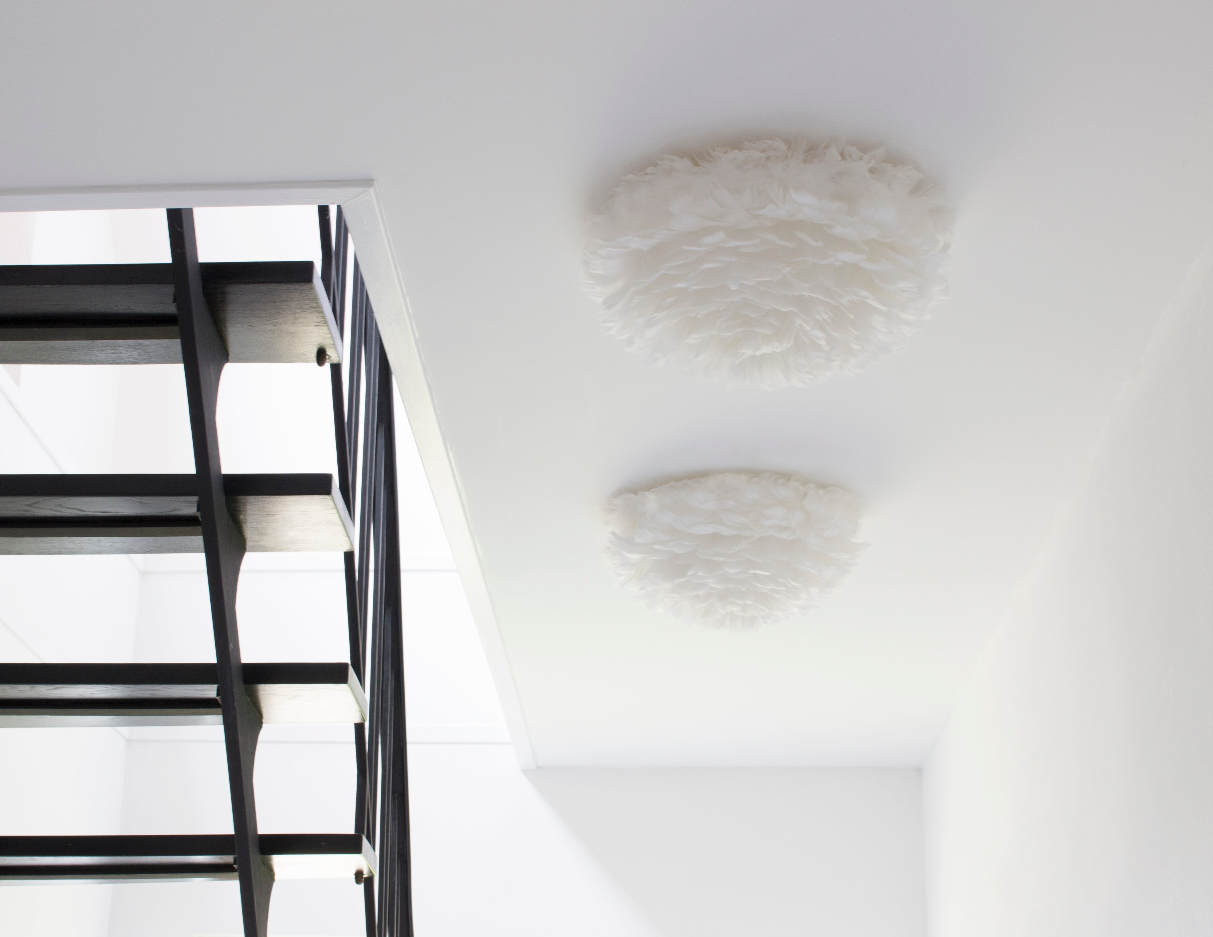 Umage Eos Up Ceiling or Wall Light mounted on a ceiling