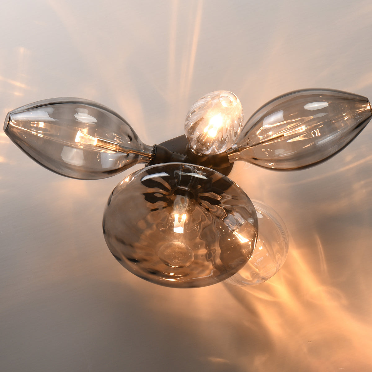 Studio M Lighting SM49300MSCLBK Ray Dance Cluster Wall Sconce in Black with Smoke and Clear glass, side profile view