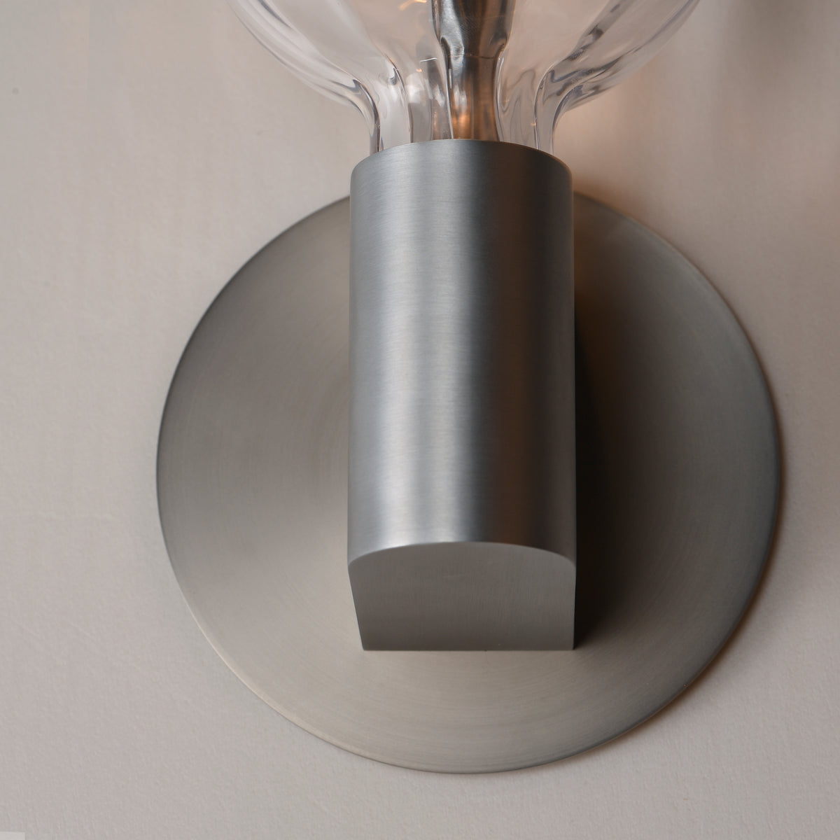 Studio M Lighting SM49324CLAL Ray Dance Globe Wall Sconce in Brushed Aluminum with Clear glass, close-up detail view