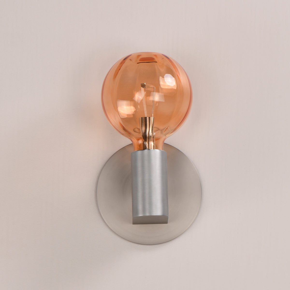 Studio M Lighting SM49324EMAL Ray Dance Globe Wall Sconce in Brushed Aluminum with Ember glass, three-quarter angle view