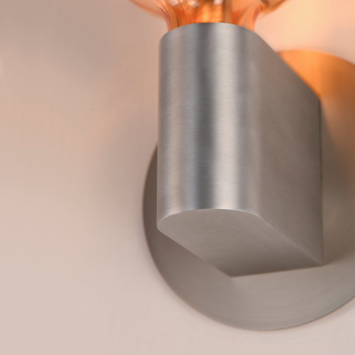 Studio M Lighting SM49324EMAL Ray Dance Globe Wall Sconce in Brushed Aluminum with Ember glass, close-up detail view