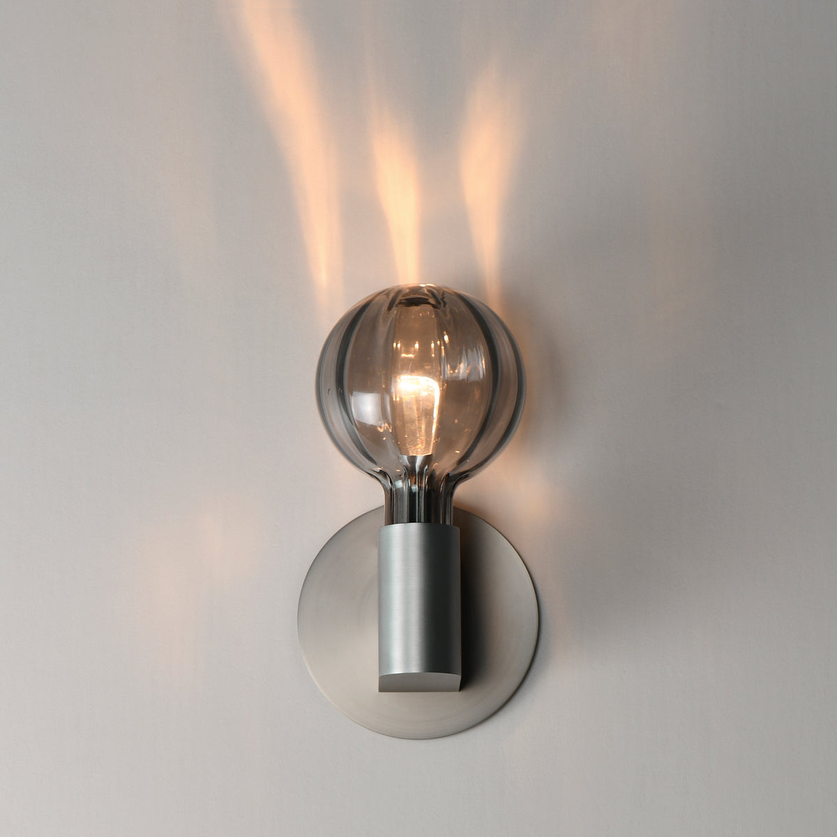 Studio M Lighting SM49324SMKAL Ray Dance Globe Wall Sconce in Brushed Aluminum with Mirror Smoke glass, installed lifestyle view