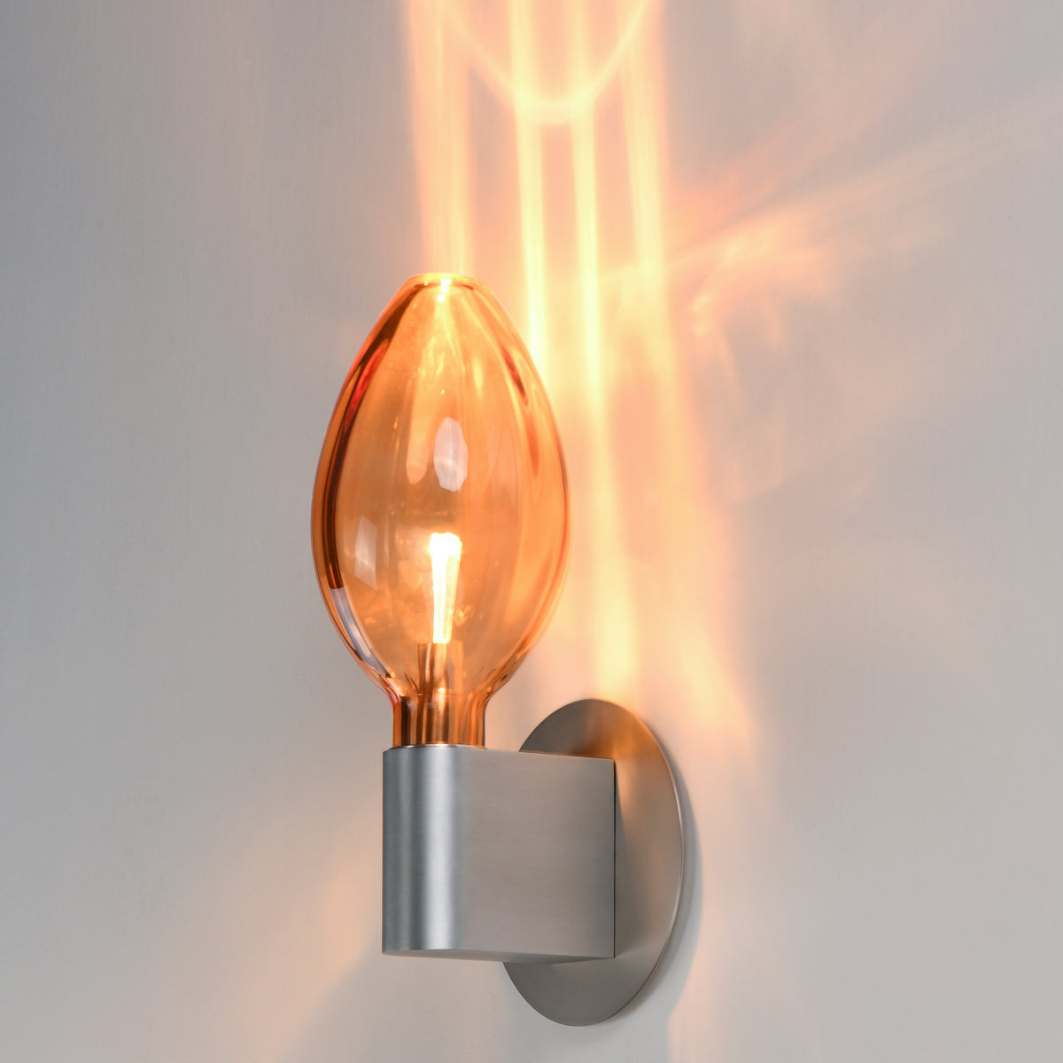 Studio M Lighting SM49325EMAL Ray Dance Olive Wall Sconce in Brushed Aluminum with Ember glass, installed lifestyle view