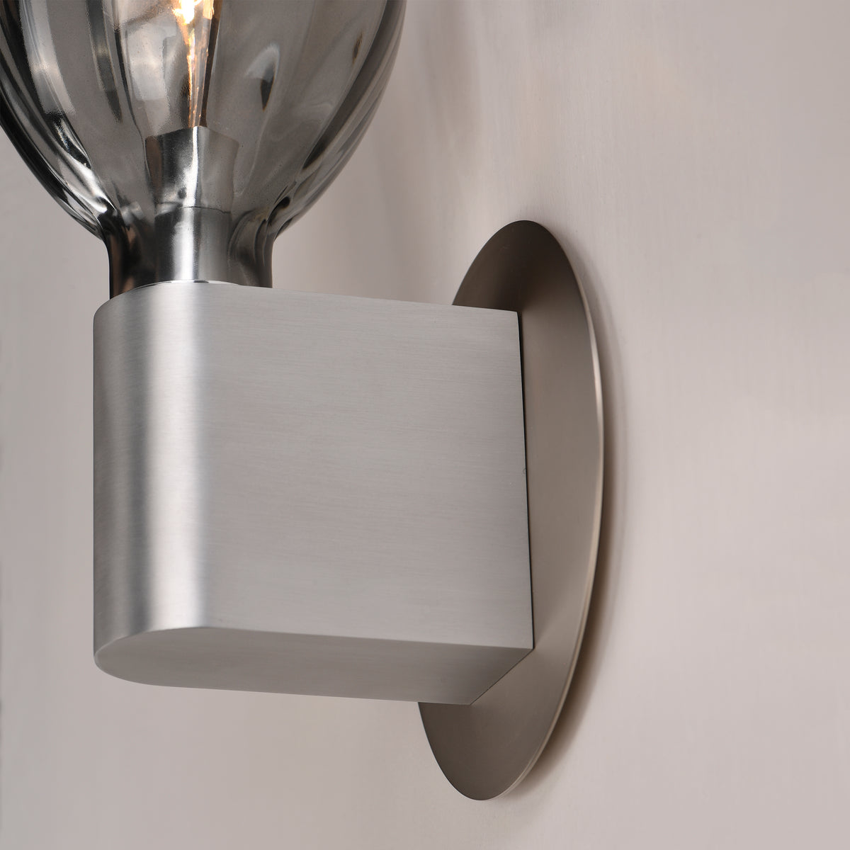 Studio M Lighting SM49325SMKAL Ray Dance Olive Wall Sconce in Brushed Aluminum with Mirror Smoke glass, close-up detail view