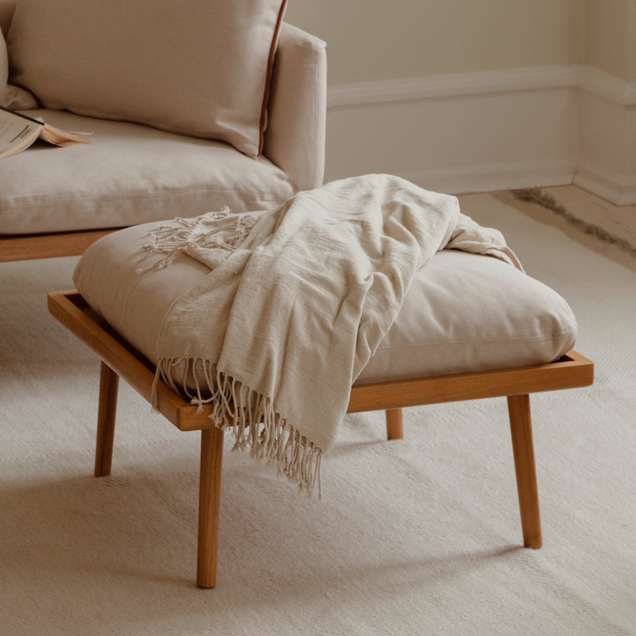 Umage Lounge Around Shuffle pouffe styled in a room setting