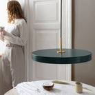 Umage Asteria LED Pendant in Forest Green in an interior setting
