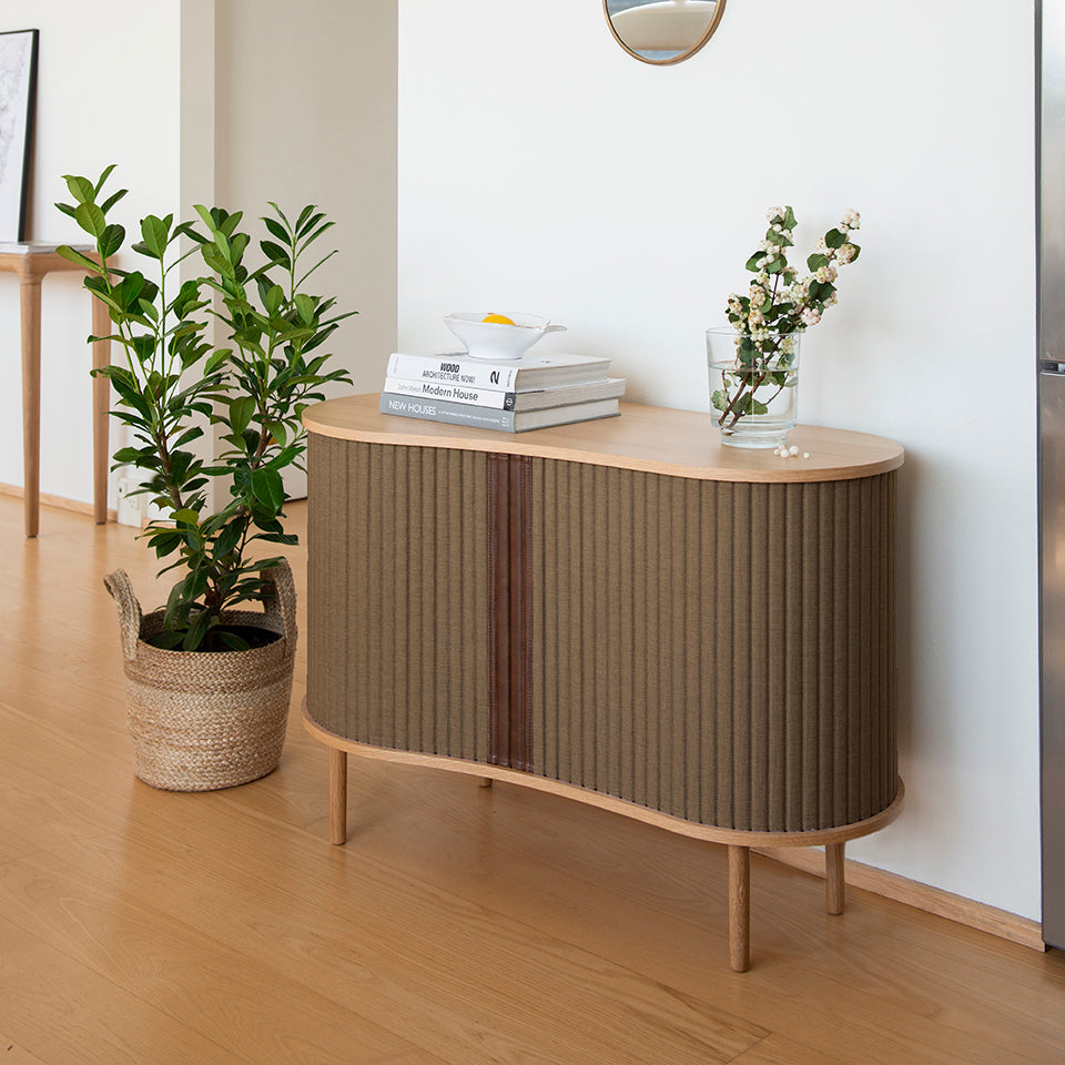 Umage Audacious Cabinet in oak with Sugar Brown doors, styled in a room