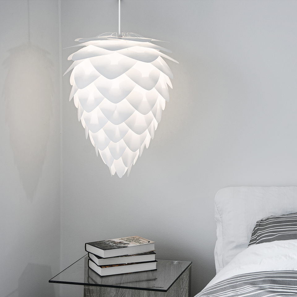 Umage Conia Tripod Table Lamp styled in a room setting