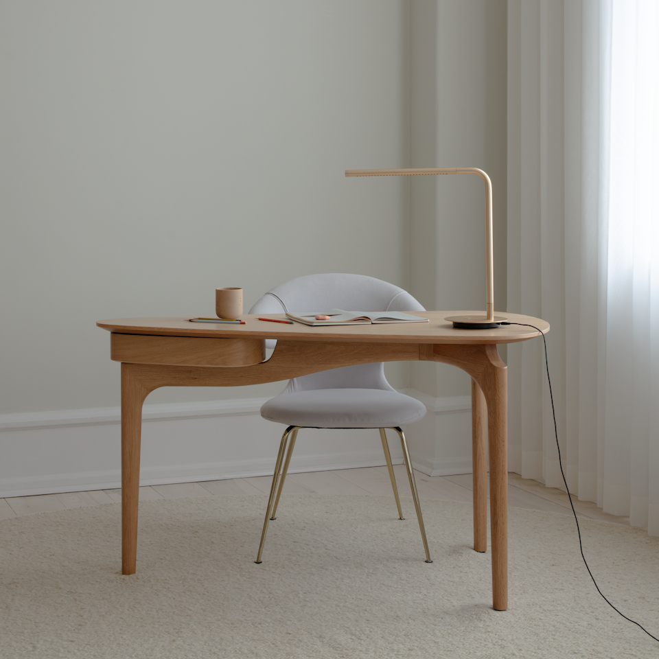 Umage Duende desk styled in a room setting