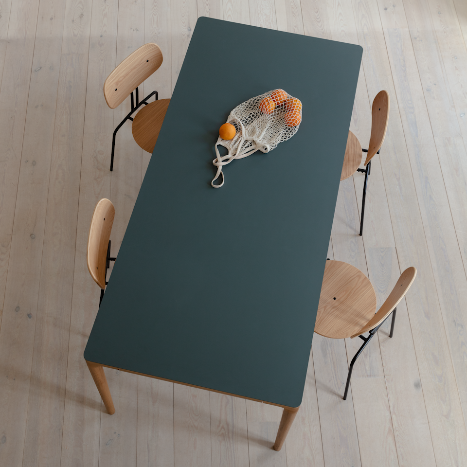 Umage Heart'n'Soul Dining Table in oak with Moss Green top, styled in a dining room