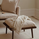 Umage Lounge Around Shuffle pouffe styled in a room setting