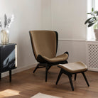 Umage The Reader Ottoman in black oak with Sugar Brown, styled with Treasures