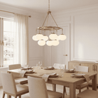 Meridian Lighting M10098NB Meridian Nine Light Chandelier in Natural Brass
