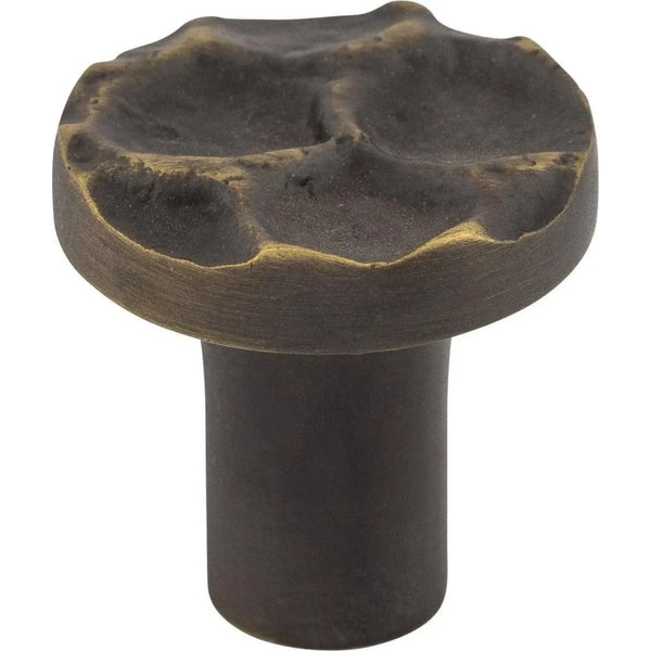 Bouton rond pavé